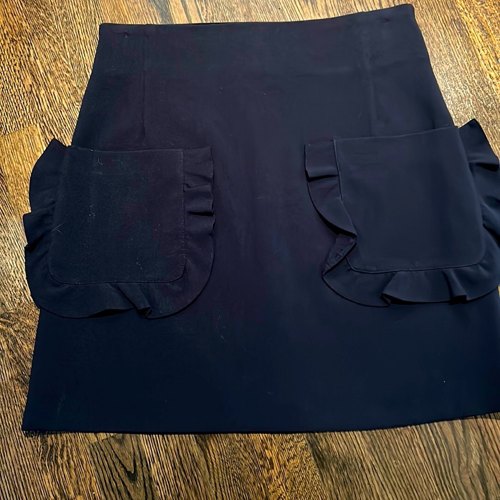Sandro mini skirt with patch pockets
